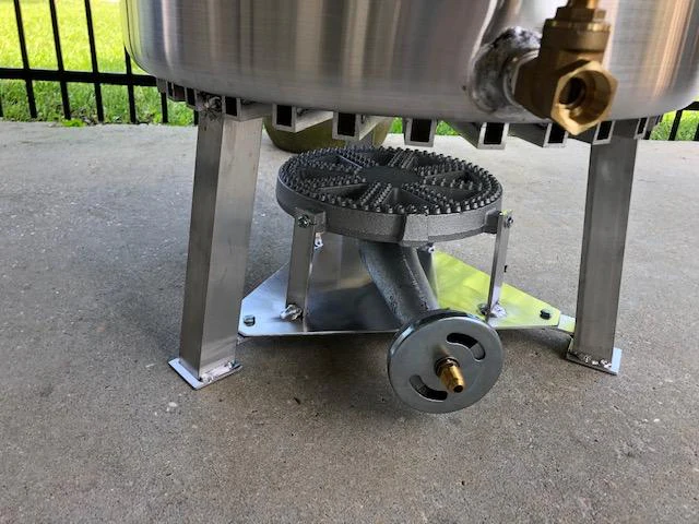 Close-up of the bottom of the Banjo Burner on concrete