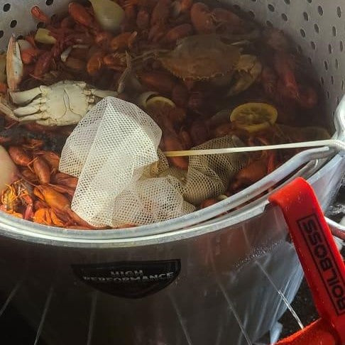 A seafood boil bag in use in a High Performance Cooker