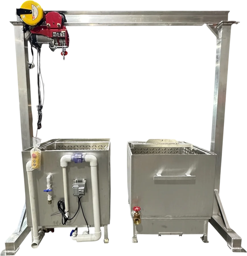A Crawcuzzi cleaner set up next to an HPC commercial boiler under a Gantry Lift System