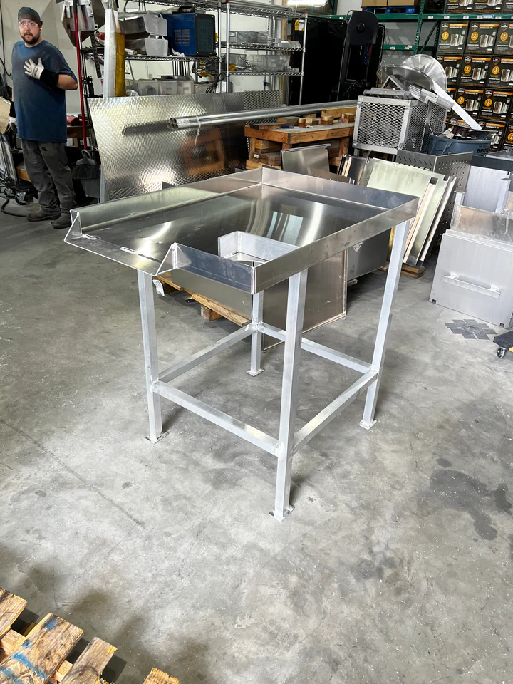 HPC crawfish sorting table in a commercial kitchen