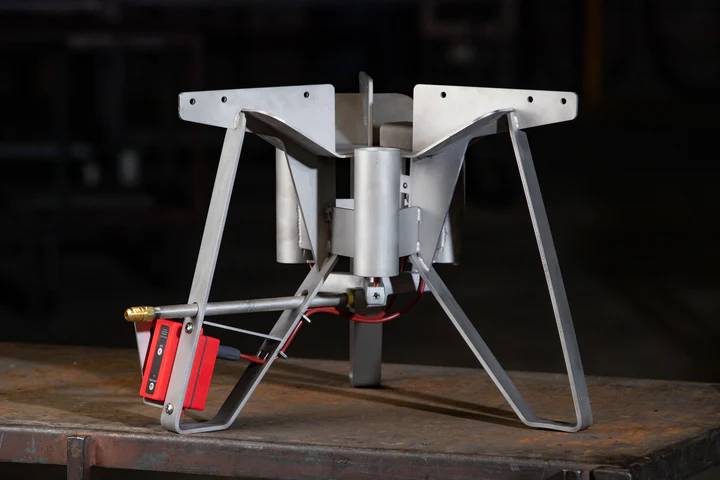 The Boil Boss Triple Jet Propane Burner on a table